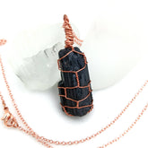 Raw black tourmaline pendant wire wrapped in copper on 20-inch chain